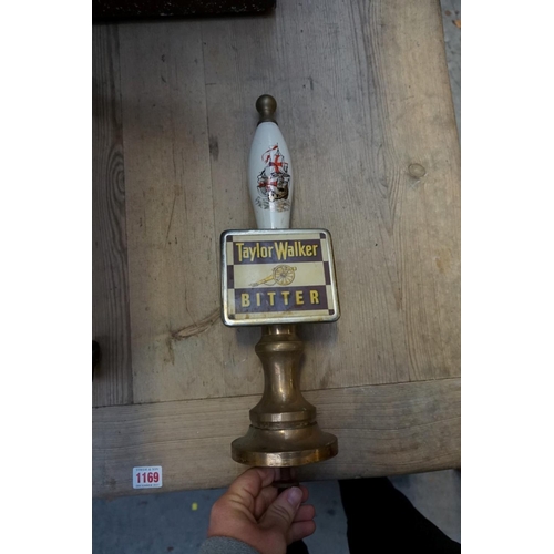 1238 - Six brass and pottery beer pump handle.