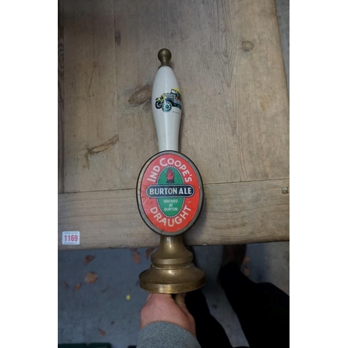 1238 - Six brass and pottery beer pump handle.