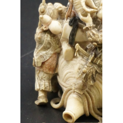 1297 - An impressive and intricate Japanese carved ivory okimono figure group, Meiji, depicting eight figur... 