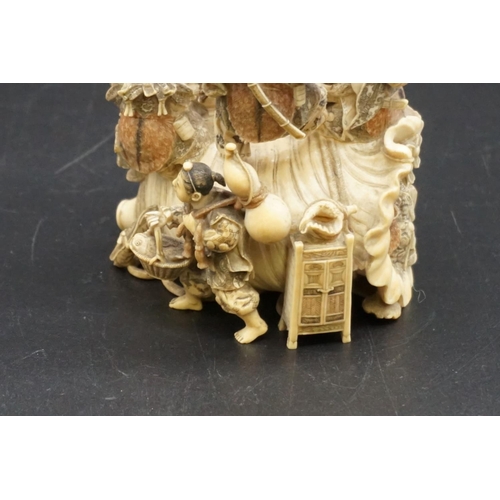 1297 - An impressive and intricate Japanese carved ivory okimono figure group, Meiji, depicting eight figur... 