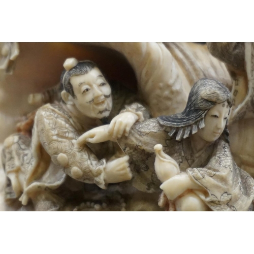 1297 - An impressive and intricate Japanese carved ivory okimono figure group, Meiji, depicting eight figur... 