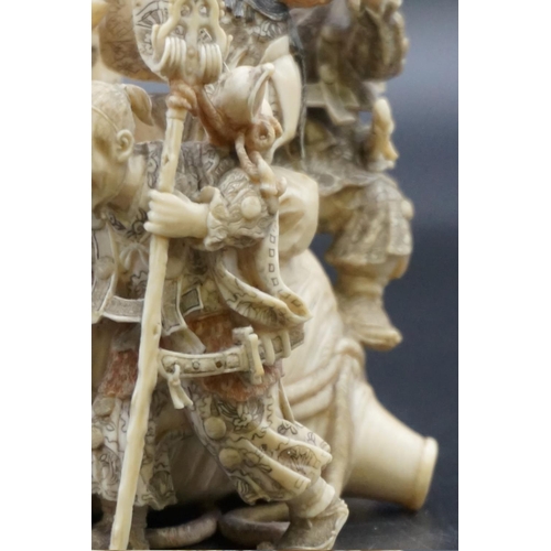 1297 - An impressive and intricate Japanese carved ivory okimono figure group, Meiji, depicting eight figur... 