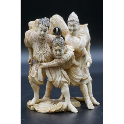 1299 - A good Japanese carved ivory okimono figure group, Meiji, depicting three Samurai warriors, signed, ... 