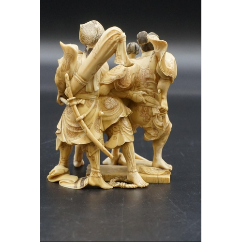 1299 - A good Japanese carved ivory okimono figure group, Meiji, depicting three Samurai warriors, signed, ... 