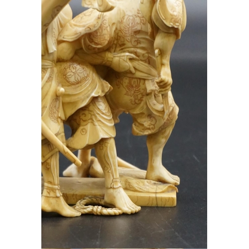 1299 - A good Japanese carved ivory okimono figure group, Meiji, depicting three Samurai warriors, signed, ... 