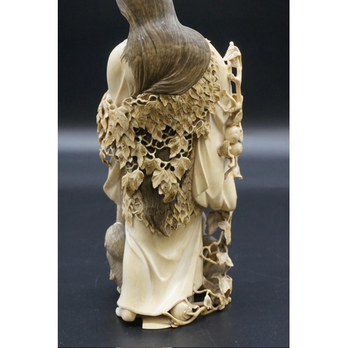 1300 - A large and impressive Japanese carved ivory okimono, Meiji, depicting Yamauba with Kintaro and monk... 