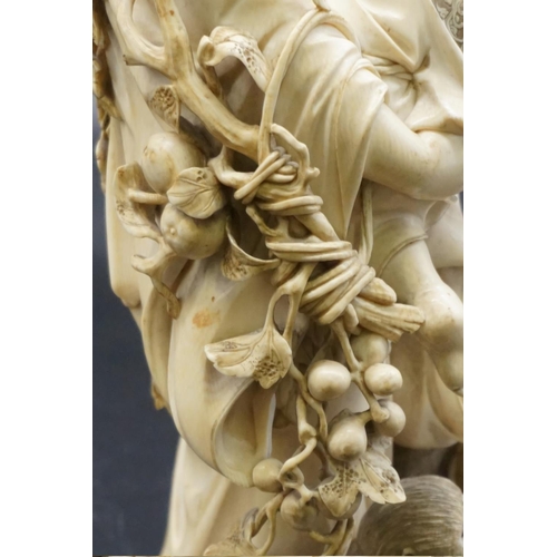 1300 - A large and impressive Japanese carved ivory okimono, Meiji, depicting Yamauba with Kintaro and monk... 