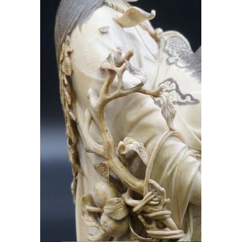 1300 - A large and impressive Japanese carved ivory okimono, Meiji, depicting Yamauba with Kintaro and monk... 