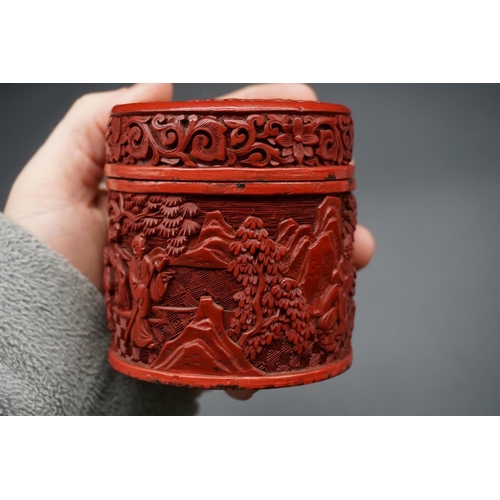 1308 - A Chinese cinnabar lacquer circular box and cover, Qing, carved with figures in a continuous landsca... 