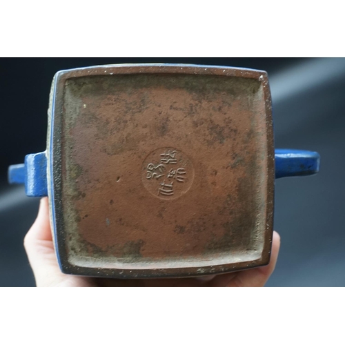 1310 - A Chinese enamelled yixing teapot, 18th/19th century, seal mark to base, painted with dragons, with ... 