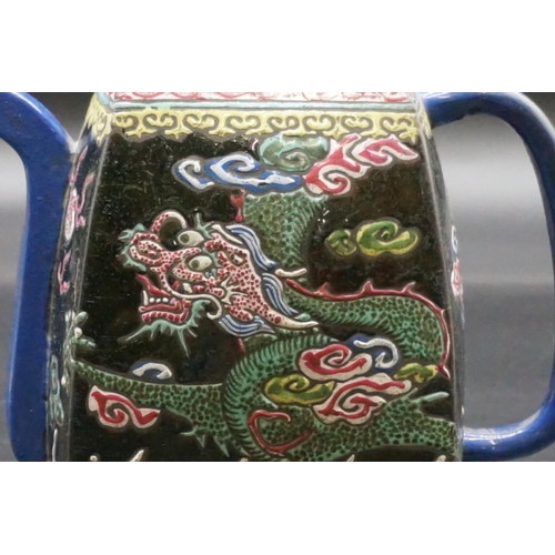 1310 - A Chinese enamelled yixing teapot, 18th/19th century, seal mark to base, painted with dragons, with ... 