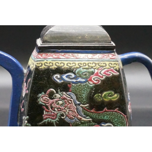 1310 - A Chinese enamelled yixing teapot, 18th/19th century, seal mark to base, painted with dragons, with ... 