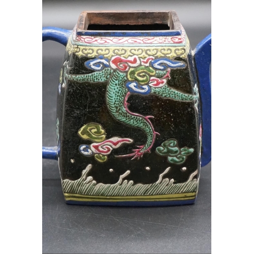 1310 - A Chinese enamelled yixing teapot, 18th/19th century, seal mark to base, painted with dragons, with ... 