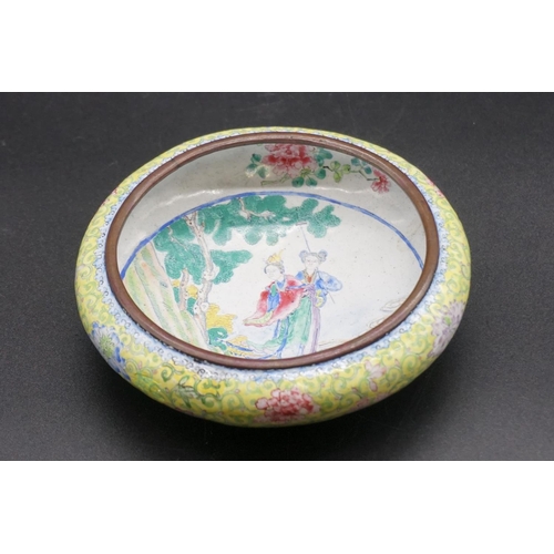 1314 - A Chinese canton enamel bowl, Qianlong four character mark and probably of the period, painted to th... 