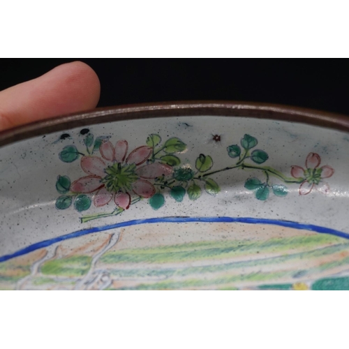 1314 - A Chinese canton enamel bowl, Qianlong four character mark and probably of the period, painted to th... 