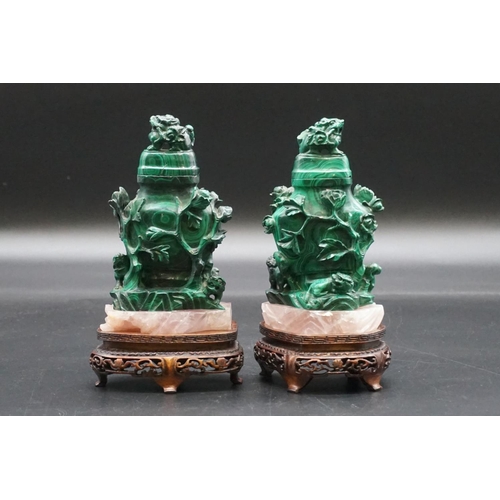 1316 - A pair of Chinese carved malachite and rose quartz vases and covers, 19th century, on carved an... 