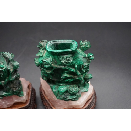 1316 - A pair of Chinese carved malachite and rose quartz vases and covers, 19th century, on carved an... 