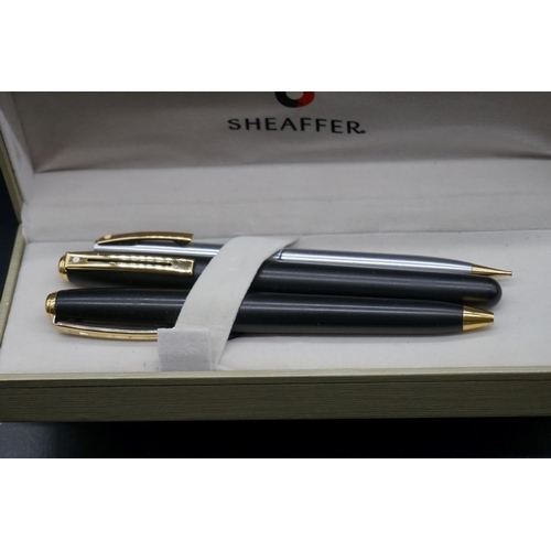 1317 - Seven various pens, to include: a Parker, with 18k nib; a cased Waterman; and a boxed Sheaffer set.... 