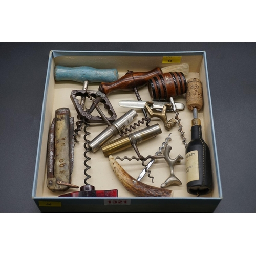 1321 - A collection of vintage corkscrews and related. 