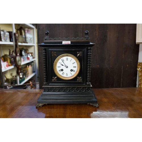 1330 - A late 19th century ebonized mantel clock, with enamel dial and bell strike, 29.5cm high, with pendu... 