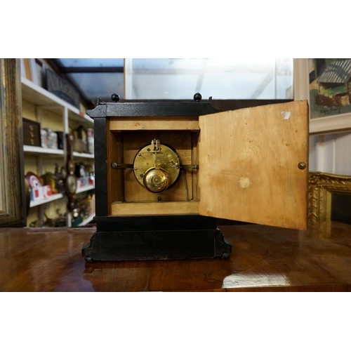 1330 - A late 19th century ebonized mantel clock, with enamel dial and bell strike, 29.5cm high, with pendu... 