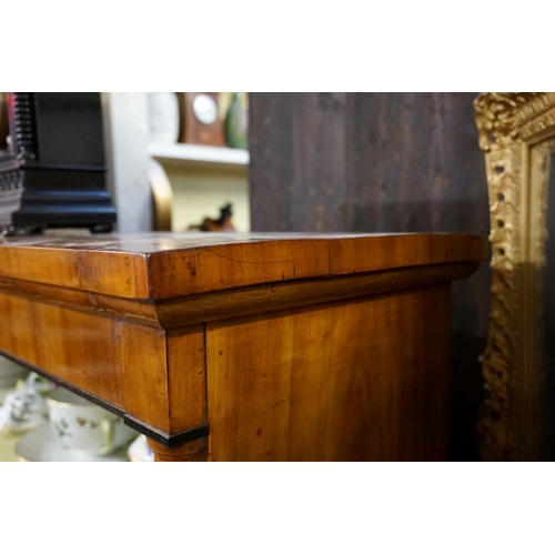 1331 - A Biedermeier walnut and ebonized open bookcase, 148cm high x 100.5cm wide.