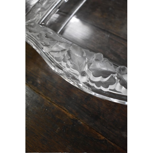 1365 - A Lalique 'Chene' frosted and clear glass tray, No.3467, 46.5cm wide, (chipped).