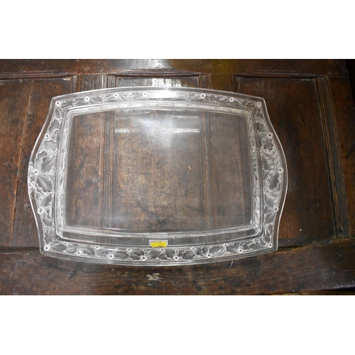 1365 - A Lalique 'Chene' frosted and clear glass tray, No.3467, 46.5cm wide, (chipped).