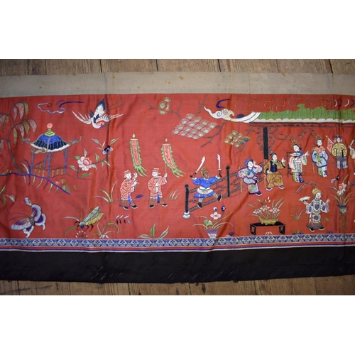 1373 - A Chinese embroidered silk panel, 19th century, depicting an emperor with various courtesa... 