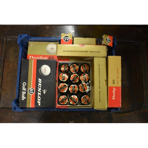 1385 - A quantity of vintage Dunlop 65 golf balls, most boxed. 