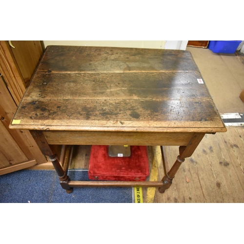 1404 - An antique oak side table, with lateral frieze drawer, 74.5cm wide. 