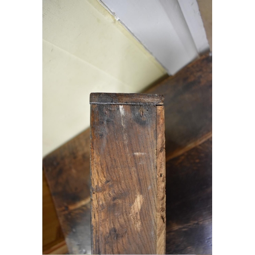 1404 - An antique oak side table, with lateral frieze drawer, 74.5cm wide. 