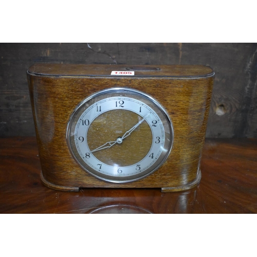 1405 - A unusual 1930s coin operated 'florin' timepiece, 28.5cm wide. 