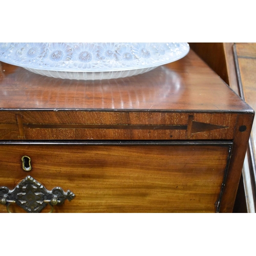 1407 - A Regency mahogany and inlaid chest of drawers, possibly Scottish, 106.5cm wide.