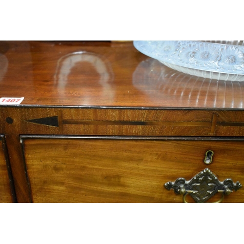 1407 - A Regency mahogany and inlaid chest of drawers, possibly Scottish, 106.5cm wide.