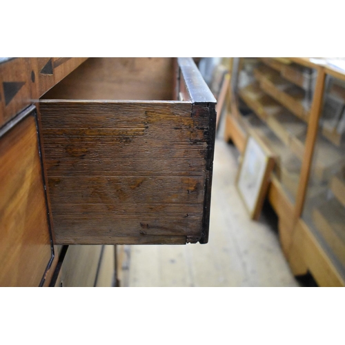 1407 - A Regency mahogany and inlaid chest of drawers, possibly Scottish, 106.5cm wide.