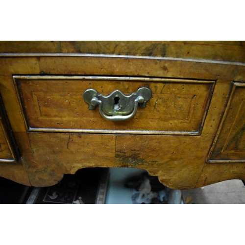 1410 - An 18th century walnut and crossbanded lowboy, on cabriole legs, 77cm wide. ... 