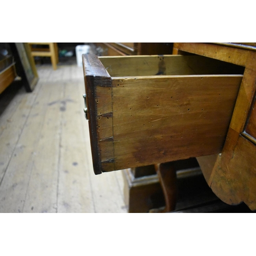 1410 - An 18th century walnut and crossbanded lowboy, on cabriole legs, 77cm wide. ... 