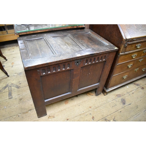 1415 - A late 17th century small oak panelled coffer, 81cm wide.