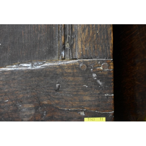 1415 - A late 17th century small oak panelled coffer, 81cm wide.