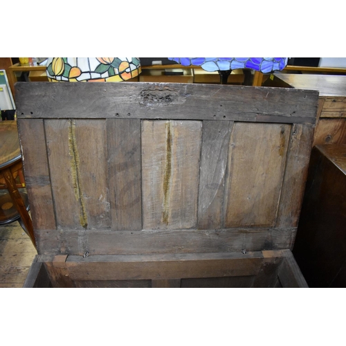 1415 - A late 17th century small oak panelled coffer, 81cm wide.