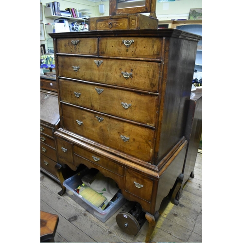 1417 - An 18th century walnut and crossbanded chest on later stand, 153.5cm high x 103cm wide.... 