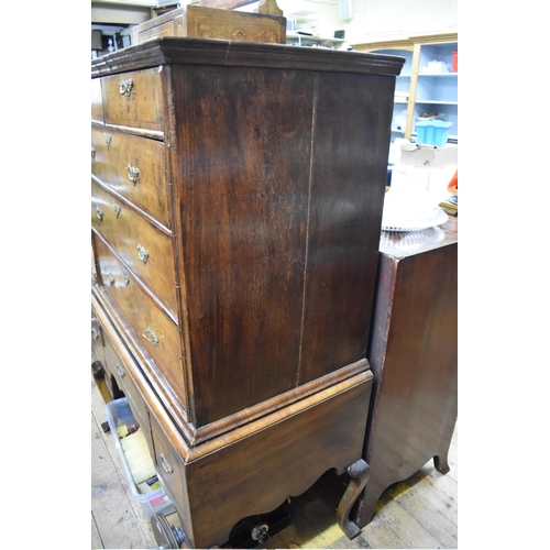 1417 - An 18th century walnut and crossbanded chest on later stand, 153.5cm high x 103cm wide.... 