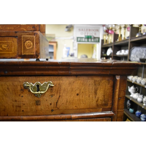 1417 - An 18th century walnut and crossbanded chest on later stand, 153.5cm high x 103cm wide.... 