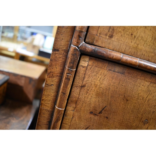 1417 - An 18th century walnut and crossbanded chest on later stand, 153.5cm high x 103cm wide.... 