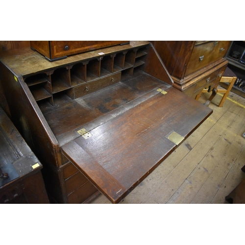 1420 - An 18th century oak bureau, 91cm wide.