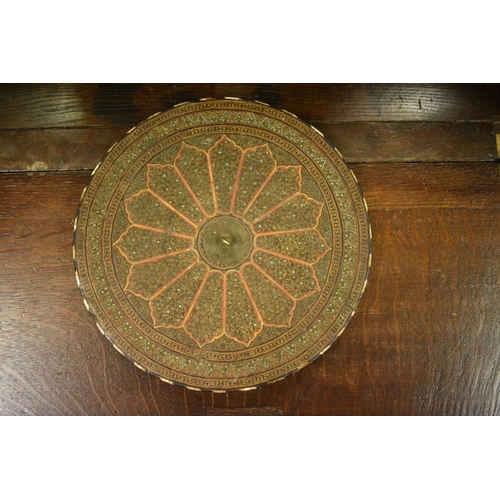 1424 - A Damascus inlaid circular mirror, 29.5cm diameter. 