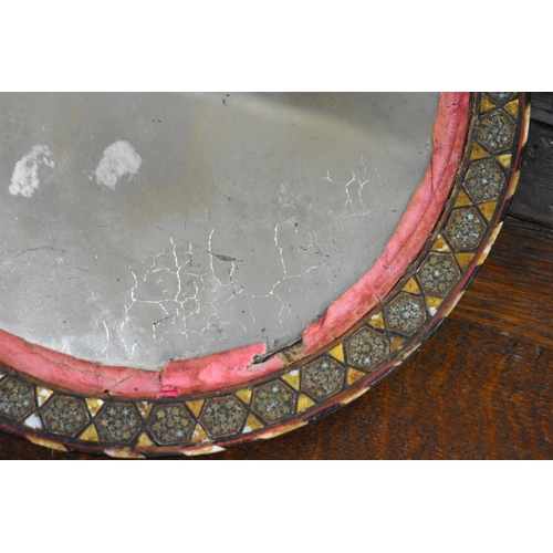 1424 - A Damascus inlaid circular mirror, 29.5cm diameter. 