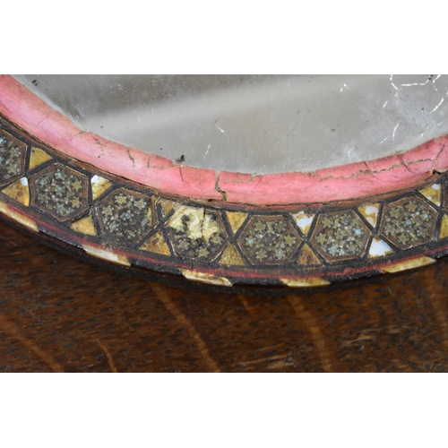 1424 - A Damascus inlaid circular mirror, 29.5cm diameter. 