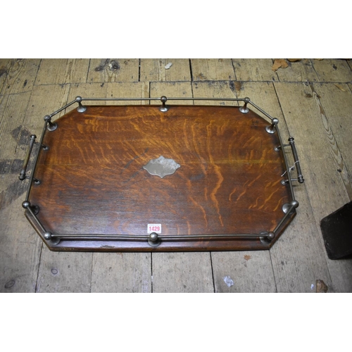 1429 - A large Victorian oak and electroplated mounted twin handled tray, 69cm wide.